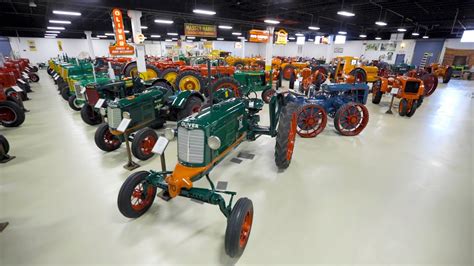Keystone tractor museum - Darold Sindt give a tour of the over 300 John Deere antique tractors he has at his museum in Keystone Iowa. Taking the tour is the Van Horne Businessmen.
